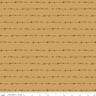 Ride the Range Fence Gold Cotton Fabric