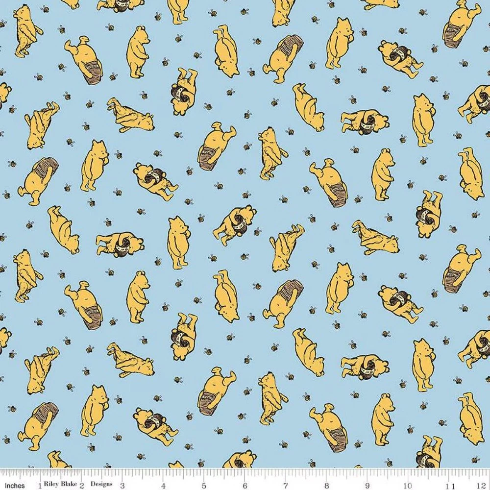 Winnie the Pooh Toss Blue Cotton Fabric